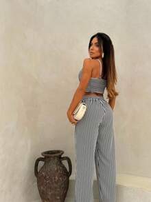 Moda Feminina| Estilo Casual| Calça Pantalona| TopAmarração| ConjuntoEstiloso| TendênciaVerão| ConjuntoListrado - Preto e Branco - Visão 4