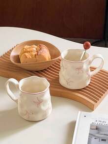 1/2件创意可爱陶瓷杯，手绘蝴蝶结图案，不对称杯身，办公休闲瓷茶杯，家用早餐杯，下午茶饮具，实用陶瓷器皿 - 彩色 - 查看 9