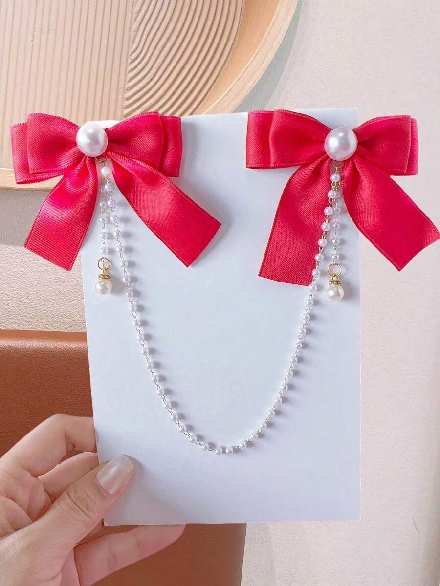 1 szt. dziewczęca, modna, śliczna spinka do włosów z kokardką i frędzlami. Nieznaczna różnica w kolorze może wynikać z partii materiału. Szczegóły na opakowaniu i w opisie produktu. Ilość perełek jest losowa. - Czerwony - Zobacz 1