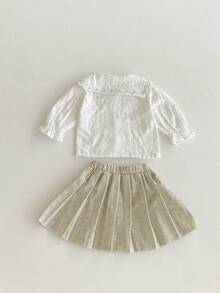 Set de 2 piezas Estilo francés dulce y preppy para niñas, blusa con cuello con volantes y lazo + falda plisada con estampado floral, corte holgado (talla arriba una)