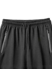 春秋青少年时尚纯色弹力腰裤，带反光印花装饰，休闲户外运动慢跑裤