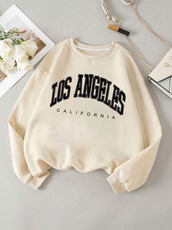 Tonårsflickas rundhalsade sporttröja med bokstavsmönster. Ny modell, lämplig för höst och vinter. Lämplig för studenter att bära när de handlar, reser eller går på fester.