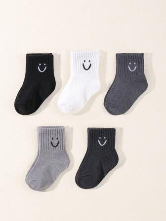 5双装儿童笑脸图案袜子，黑白配色，百搭休闲中筒袜，返校运动袜