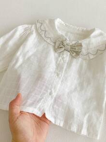 Set de 2 piezas Estilo francés dulce y preppy para niñas, blusa con cuello con volantes y lazo + falda plisada con estampado floral, corte holgado (talla arriba una)