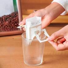 Filter Bag, Coffee Filter Paper, Tea Filter Bag, Disposable Filter Bag. Coffee Shop, Family Daily Coffee Filter Bag. Each Package Contains 50 Pieces. Hanging Ear Filter Bag, Suitable For Most Sizes Of Cups.