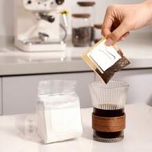 Filter Bag, Coffee Filter Paper, Tea Filter Bag, Disposable Filter Bag. Coffee Shop, Family Daily Coffee Filter Bag. Each Package Contains 50 Pieces. Hanging Ear Filter Bag, Suitable For Most Sizes Of Cups.