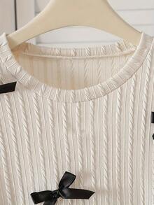 少女服装，时尚可爱精致蝴蝶结上衣搭配半身裙套装，休闲优雅时尚 - 适合春秋季穿着。 - 杏色 - 查看 5