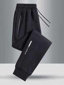 春秋青少年时尚纯色弹力腰裤，带反光印花装饰，休闲户外运动慢跑裤