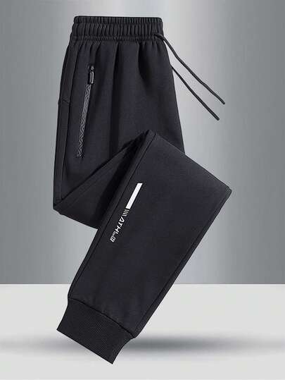 Pantalones de cintura elástica de unicolor con decoración de impresión reflectante, pantalones jogger casuales para deportes al aire libre para adolescentes en primavera y otoño