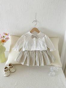 Set de 2 piezas Estilo francés dulce y preppy para niñas, blusa con cuello con volantes y lazo + falda plisada con estampado floral, corte holgado (talla arriba una)