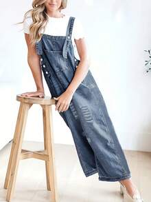 Pantalones de peto sueltos con lavado medio y desgastados de moda y versátiles