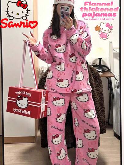 Sanrio 1 conjunto de pijama e roupão femininos de flanela grossa estampada com a Hello Kitty. Este é um pijama estilo desenho animado que combina aconchego e um toque casual.
