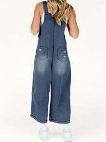 Pantalones de peto sueltos con lavado medio y desgastados de moda y versátiles