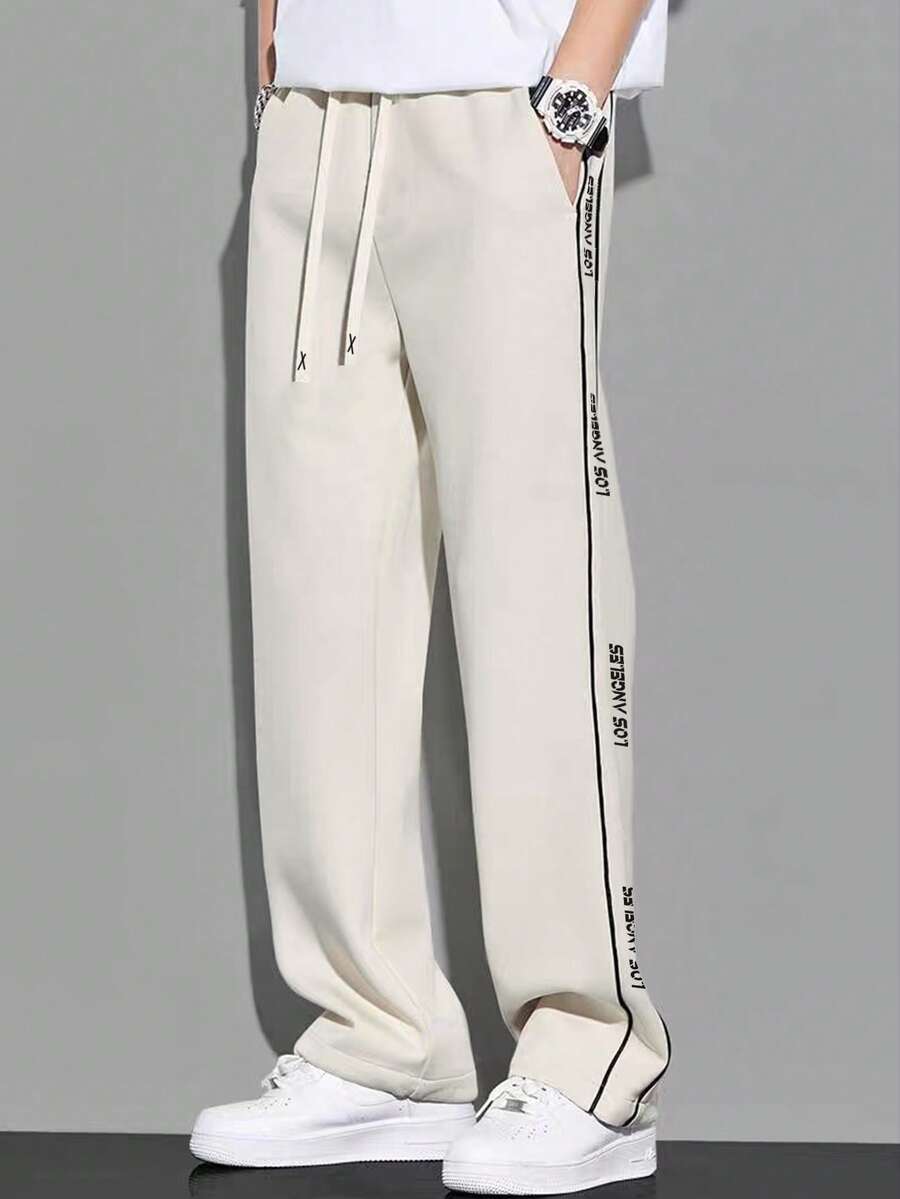 男士杏色大尺寸寬腿運動長褲,寬鬆版型街頭風慢跑褲,舒適休閒運動長褲,適合秋季 - 杏色 - 查看 1