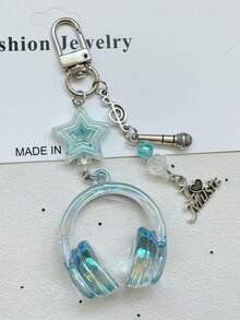 1个男女通用新款ins风透明音乐耳机造型钥匙扣，创意迷你麦克风星形音符配件，个性化手机挂绳，包包挂饰，钥匙链，送给音乐爱好者的礼物，可作为包包挂饰、汽车挂饰、老师礼物、朋友礼物、姐妹礼物等。 - 彩色 - 查看 8