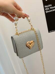 这款时尚闪亮的迷你心形手提包采用磁扣设计，是晚宴场合的完美之选。其独特的设计使其成为一款百搭别致的单肩/斜挎包，适合日常使用。这款高品质手提包有多种颜色可选，是斋月期间的必备时尚单品，也是馈赠亲友的理想之选。 - 時尚愛心 - 查看 5