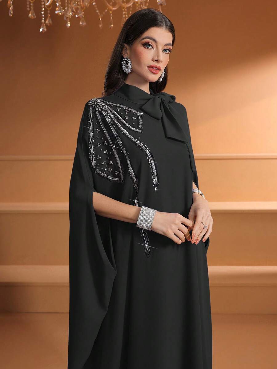 Elegant Black Long Woven Fabric Abaya With Beaded Embroidery Tie Neck And Batwing Half Sleeves