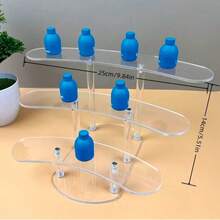 Suport multi-nivel pentru depozitarea cosmeticelor și obiectelor, cu 1 buc., cu configurații cu 5, 4, 3, 2 sau 1 strat, construit din material acrilic transparent. Acest organizator versatil este conceput pentru depozitarea cosmeticelor.