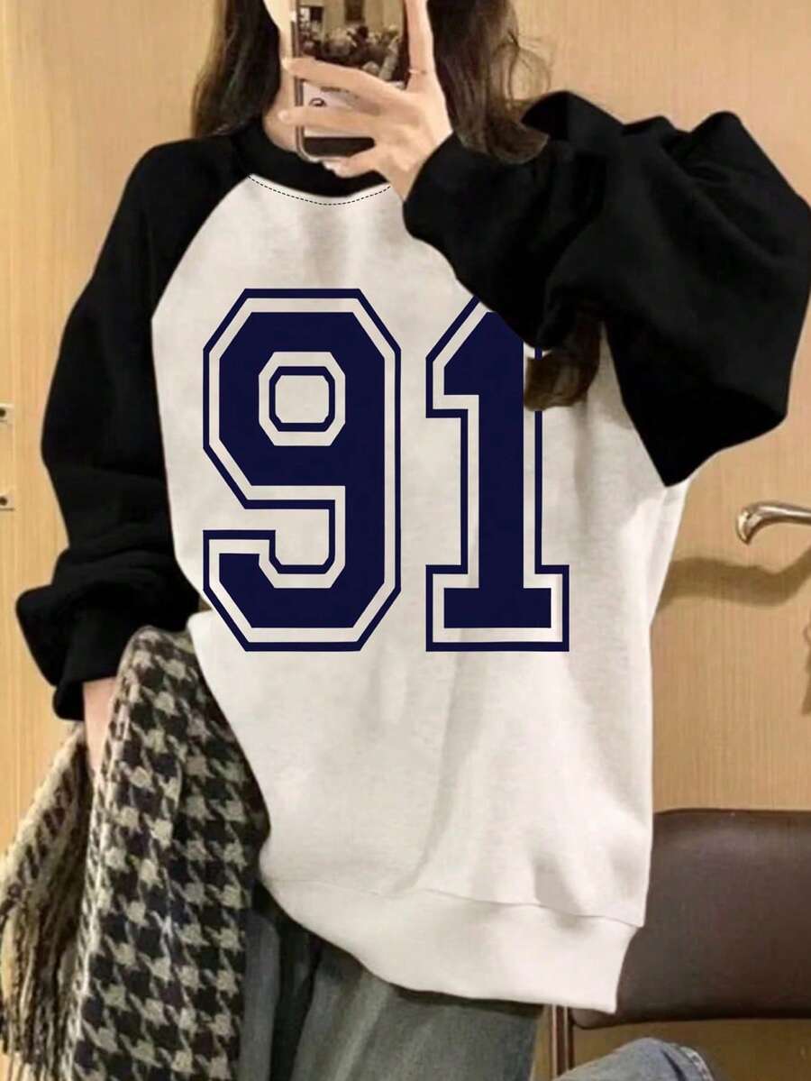 1件女款拼色拼接插肩袖數字衛衣,柔軟面料,運動休閒多季節風格 - 黑色 - 查看 1