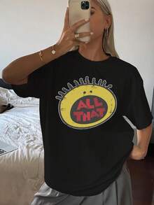 Camiseta gráfica de inspiración vintage para mujer con un diseño circular único y letras llamativas. Suave mezcla de algodón para un look casual y cotidiano. ¡Imprescindible para las camisetas gráficas de moda! Talla extragrande. - Negro - Ver 1