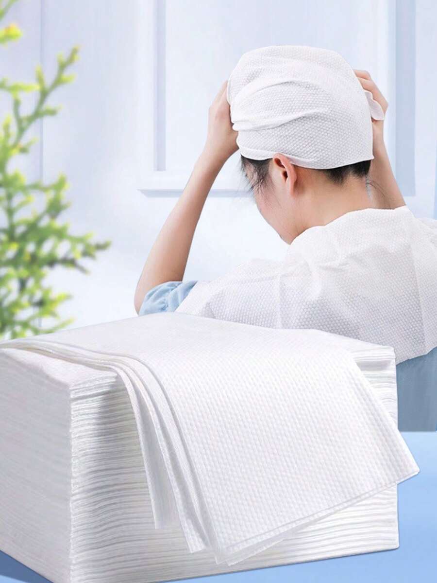 20/100条装白色一次性美容巾，30厘米 x 50厘米实用尺寸，满足多场景需求，柔软亲肤材质，不掉毛，吸水性强，使用方便！小巧便携，方便旅行，快速吹干头发，卫生卫生，方便酒店住宿，徒步露营