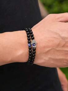 YAUKIA 邪恶之眼天然黑玛瑙珠弹力男女通用手链力量保护勇气 - 6 毫米简约精致堆叠手链珠宝 - 黑色 - 查看 1