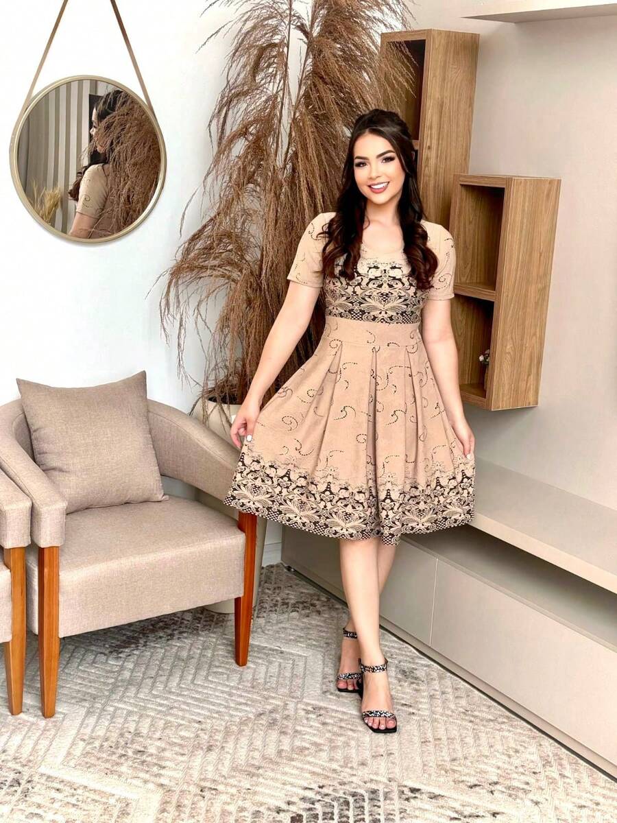 VESTIDO MIDI SAIA RODADA MANGA CURTA DECOTE REDONDO EM TECIDO JACQUARD COM RELEVO.