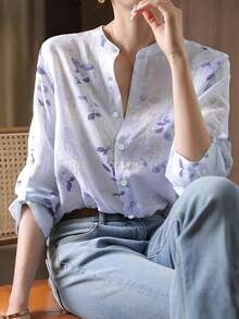 Camisa casual holgada de mujer con estampado de plantas y mangas con volantes de un solo botonadura