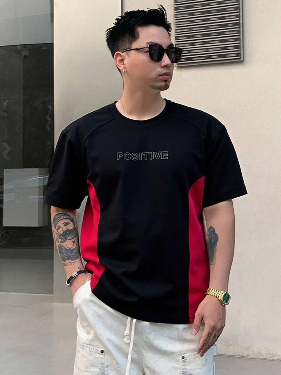 Impala Playera deportiva negra con estampado "Positive" y bloques rojos para hombre THEMAL