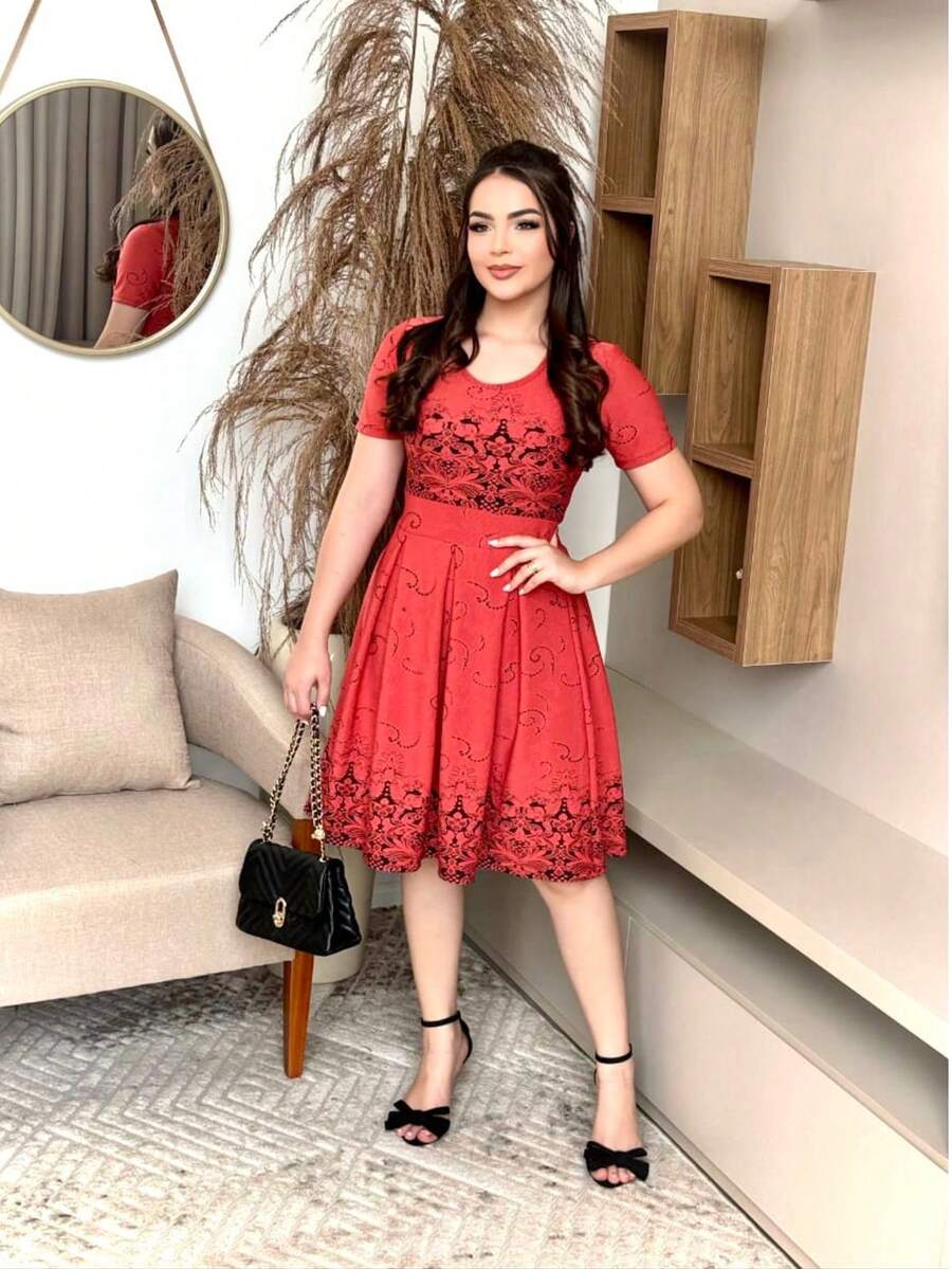 MIDI DRESS WITH FLORAL SKIRT, SHORT SLEEVES, ROUND NECKLINE IN JACQUARD FABRIC WITH EMBOSSING. - Orange - View 1