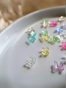 50/100 pezzi Mini decorazioni per unghie a forma di farfalla aurora, gioielli per unghie piatti iridescenti a fiocco, accessori per unghie, forniture per unghie, stile Y2K, parti per unghie Y2K, parti per decorazioni fai-da-te, charm per unghie, charm, articoli per unghie