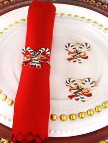 2/4/6 pièces Anneaux de serviette de canne de bonbon de Noël, supports de serviette de décoration de table à dîner d'hôtel de Noël, supports de serviette en papier de canne de bonbon de Noël, pinces à serviette de Noël, convient pour la décoration de nappe de table à dîner de fête de Noël
