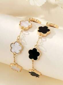 2 pezzi Set di braccialetti alla moda con design classico a erba fortunata in bianco e nero