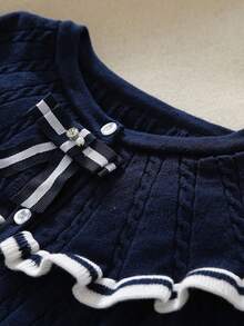 女童开襟羊毛衫外套，饰有蝴蝶结、荷叶边、罗纹针织、圆领和插肩袖，甜美优雅的学院风，休闲百搭，适合3-12岁女孩，秋冬春秋季均可穿着。 - 藏蓝色 - 查看 3