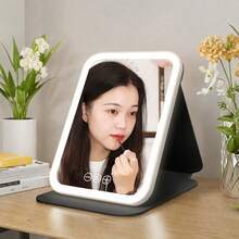 Gương trang điểm có đèn LED độ phân giải cao 10 inch, độ phóng đại 10X, 60 đèn LED tích hợp, gương trang điểm chuyên nghiệp di động có thể gập lại với chân đế xoay 360°, điều khiển cảm ứng, 3 chế độ màu có thể điều chỉnh độ sáng, pin sạc, vỏ bảo vệ bằng da PU, thích hợp cho gia đình và du lịch, chức năng phóng đại giúp trang điểm chính xác, lý tưởng cho các chuyên gia trang điểm, bàn trang điểm phòng ngủ và là món quà hoàn hảo cho phụ nữ, quà tặng, du lịch, đồ dùng giá rẻ, vật dụng cần thiết khi đi du lịch. - Nhiều màu - Xem 12