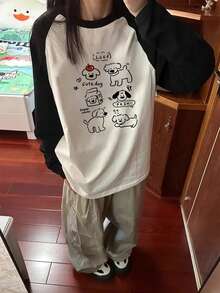 女士宽松休闲百搭印花插肩袖撞色卡通印花长袖T恤 - 黑與白 - 查看 3