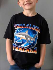 Camiseta para niños de 3 a 12 años de 100% algodón Manga Corta y Cuello Redondo Muy Suave y Cómoda con diseños divertidos Estampado de Brainrot  con la leyenda "Tralalero Tralala" Playeras cómodas Glorbo Fruttodillo - Negro - Ver 1