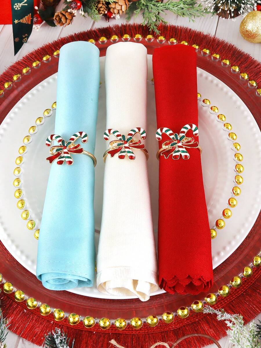 2/4/6 pièces Anneaux de serviette de canne de bonbon de Noël, supports de serviette de décoration de table à dîner d'hôtel de Noël, supports de serviette en papier de canne de bonbon de Noël, pinces à serviette de Noël, convient pour la décoration de nappe de table à dîner de fête de Noël