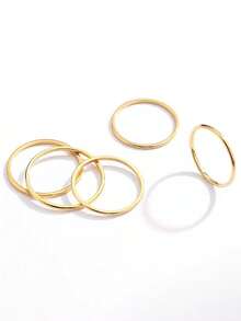 Fünfteiliges Set aus goldfarbenen minimalistischen Edelstahl-Schlichtringen - stapelbare Kreisringe für Frauen