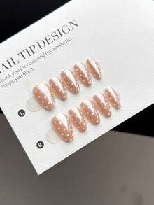 10片装手工可佩戴美甲贴片，短款杏仁形按压式假指甲，流行时尚款式，亮粉色底色搭配流行的白色波点图案，是一款高端美甲贴片产品，适合女性和女孩日常佩戴，套装包含美甲用品和手工按压式假指甲。 - 彩色 - 查看 3