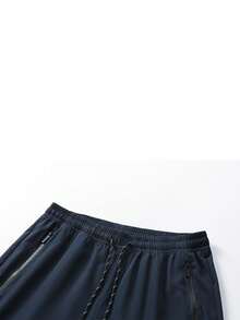 男士加大码宽松休闲运动裤，拉链口袋，抽绳腰带，修身显瘦，适合日常穿着和运动 - 轻便透气，适合春夏穿着