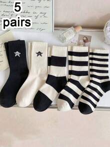 5 أزواج من الجوارب متوسطة الطول ذات نمط النجوم الأسود والأبيض للجنسين، ضرورية لإطلالات العودة إلى المدرسة