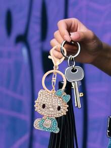 Sanrio قلادة مفتاح السيارة مرصعة بالراين ستون لهالو كيتي من سانريو، قلادة معدنية بشكل فراشة لحقيبة كيتي، قابلة لإعادة الاستخدام لتثبيتها على المفاتيح أو حلقات الحزام أو الحبال أو الحقائب، لتزيين حقيبتك أو محفظتك أو الحقيبة الظهرية