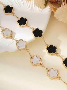 2 pezzi Set di braccialetti alla moda con design classico a erba fortunata in bianco e nero