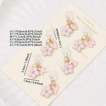 Dop de praf pentru port de încărcare telefon 2 în 1 cu sakura roz + 26 de litere, accesoriu rafinat cu pandantiv din aliaj, proaspăt, dulce și drăguț, decor pentru port de încărcare pentru smartphone, tabletă, căști Kindle, dop transparent anti-praf din silicon, potrivit ca un mic cadou, port de încărcare telefon impermeabil și anti-umezeală, compatibil cu iPhone Lightning/Type-C, protejează ferm portul de încărcare, design drăguț