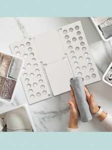 衬衫折叠板、衣物折叠板、塑料洗衣折叠架、家用收纳工具、T恤折叠板、T恤折叠器、衣物折叠板、塑料洗衣折叠架、可调节塑料衣物折叠板、便捷衣物整理器、多孔设计方便居家收纳、成人儿童适用 - 彩色 - 查看 6