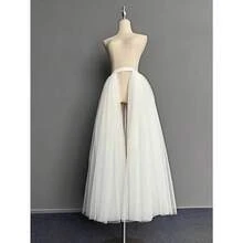 一件时尚多层薄纱裙，配有可拆卸透明网纱衬裙，采用涤纶面料，适合搭配伴娘礼服和晚礼服。 - 白色 - 查看 7