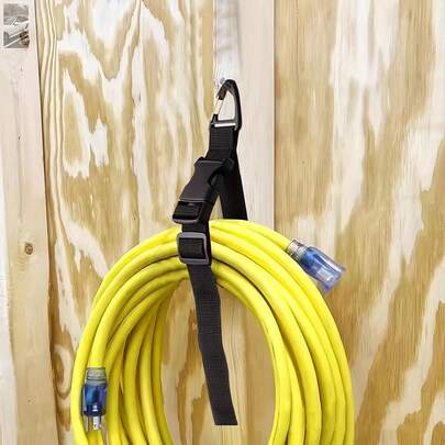 1PC Heavy Duty Extension Cord Holder Organizer (Black) 17 Inch Adjustable Storage Straps With Triangle Clips. The Ultimate Solution For Organizing Garden Hoses, Extension Cords, Cables, And Power Lines In Garages, Workshops, Boats, And Marine Accessories. This Durable Cord Keeper Is Also Perfect For Halloween Decorations, Keeping Your Spooky Light Strings And Electric Props Neatly Stored And Ready To Use. Ideal For Storing Christmas Lights, Electric Wires, Men's Tools, And Gadgets. A Must-Have For Home, Garage, Workshop, RV, Boat, And Holiday Setup.