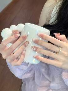 10 件甜美粉色渐变手工指甲按压指甲，3D 蝴蝶结和金属装饰，带圆点猫眼法式指甲片，闪亮全覆盖假指甲，中长棺材指甲，含果冻胶和指甲锉，浪漫风格女士指甲