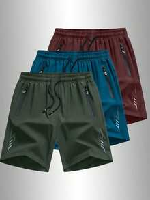 男士运动休闲宽松速干短裤，采用反光条设计，配有口袋、拉链和腰部抽绳，适合健身、跑步和户外活动